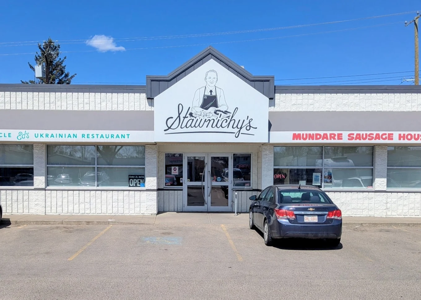 Storefront of Stawnichy's Mundare Sausage House in Edmonton, an ongoing Lazo Electric service client